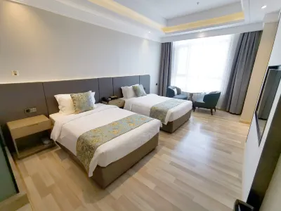 Xingcheng Hotel (Harbin Qunli Yintai City Shopping Center) Отели рядом с достопримечательностью «Озеро Нагай-Цзянь»
