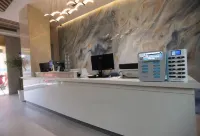 โรงแรมฮอลิเดย์หยุนฟาน เหมิงหลา - โรงแรมราคาถูก