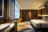 GEM Hotel (Xinyang Xi County Longhu Central City Wuyi Road) - พร้อมWifi