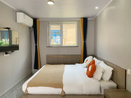 Sanmianhai Homestay (Rongcheng Chengshantou Motianling Branch) Отели рядом с достопримечательностью «Hai Lv Dao»