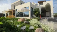 Ku'erdening Qianqian Courtyard · Garden Villa - bar