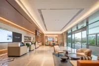 Echarm Hotel (Maoming Xinyi Convention Center Douzhouli Cultural and Creative Street)