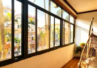 Jinheju Simple Vacation Apartment (Dai Ethnic Ancient Town Mangshi Square) - 2-Star