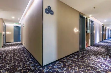 100 Inn (Zhoupu Wanda) Отели рядом с достопримечательностью «Shanghai Graduate School of China University of Technology»