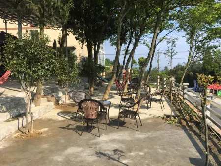 Chongqing Ruiju Farmhouse Отели рядом с достопримечательностью «Banliao Lake»