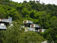 Seven villages-Earth house Hotels near Pengzhou Sports Center