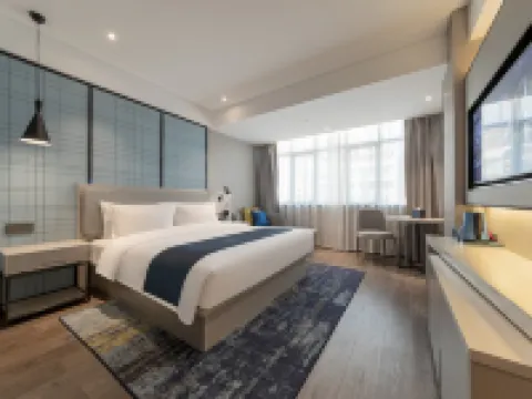 Echarm Hotel (Huangshi Daye Gaotiebeizhan Jinjiuchang) Hoteles en Daye