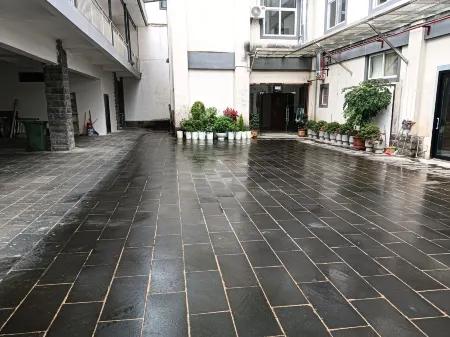 Xingcan Hotel Отели в г. Лунлинь