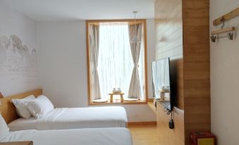 Puyi AUSOTEL WOW Hotel (Yingxi Corridor of Mountain Peaks)