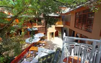 guangnan bamei moxi inn فنادق في قوانغ نان