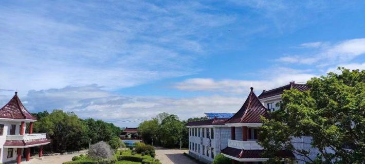 Mishan Hujing Garden Hotel Hotele w: Mishan