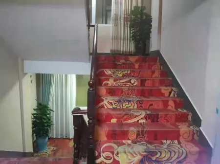 Tianxin Business Hotel, Asahikawa Отели рядом с достопримечательностью «Longchuan Gymnasium»