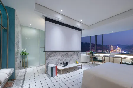 Xishuangbanna Shanguan Sky View Hotel (Gaozhuang Xishuangjing Xingguang Night Market) Отели рядом с достопримечательностью «Xishuangbanna Folk Custom Garden»