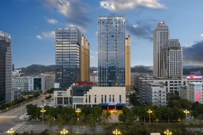 Yeste International Hotel (Chongzuo Youyi Avenue South Railway Station) Отели рядом с достопримечательностью «Ши Цзиньлинь Пейзаж»