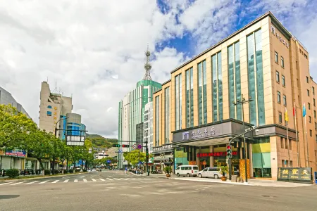 Maison New Century Hotel Отели рядом с достопримечательностью «Wugongshi Wharf»