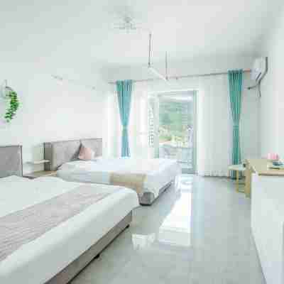 xishuangbannaQiqiGuanJiangJiuDian Rooms