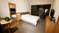 XinYi Hotel - 2-نجوم
