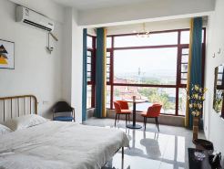 Gasa Yunshang Homestay (Xishuangbanna Jinghong High-speed Railway Station)