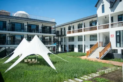 YUNJI HOTEL Отели рядом с достопримечательностью «Nalati Hayin Sai Folk Village»