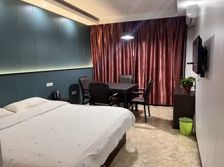 Shengxin Hotel Отели в г. Линьи