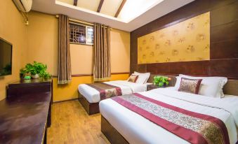 Jinxiu Zhixing Business Hotel