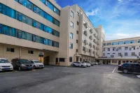 Jiuqi Yazhi Hotel - Parkplatz