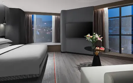 Yishang Oriental Hotel (Wanda Plaza Aoti Center Store) Отели рядом с достопримечательностью «Guangyuan Wetland Park»