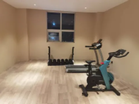 Langou Shangpin Hotel (People's Shopping Mall Shop) Hoteles en Pingyi