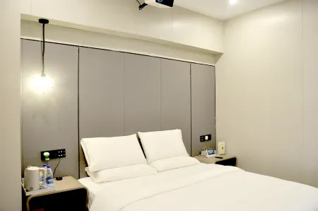 Tuke China Hotel (Yongxiu Government Plaza Branch) Отели рядом с достопримечательностью «bai lian hu shi di gong yuan»