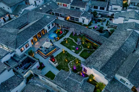 Hongcun wenshe · 20 dream Huipai private garden home stay Отели рядом с достопримечательностью «Yujianxiuli Water Town»