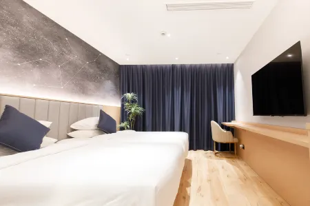 Limitland Hotel (Jinhua Station Branch) Отели рядом с достопримечательностью «Zhejiang Normal University»