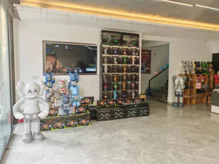 Quark Alliance E-sports Hotel Отели рядом с достопримечательностью «Xishuanghu Baihe Park»