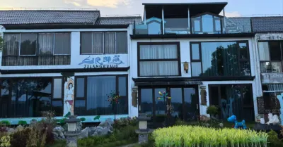 Xihai Qingsu Hotels near Wuning Huayuan Valley