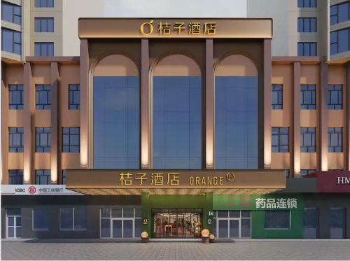 Orange Hotel (Hami Jianguo North Road Huijia Times Hami Shopping Center) - parking