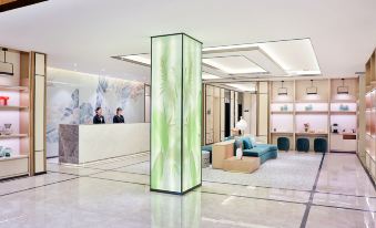 Orange Shanghai Longbai New Village Subway Station Hotel