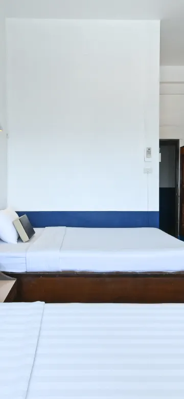 ห้องดีลักซ์เตียงแฝดพร้อมห้องอาบน้ำฝักบัว