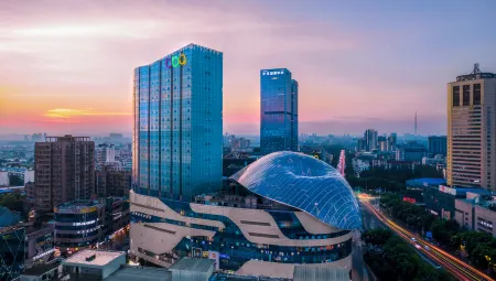 Jato Hotel (Hualong Bubugao) Отели в г. Сянтань