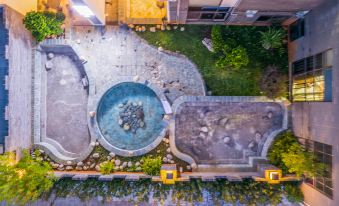 Maitreya Sanlong Hotel (Huquan Hot Spring Ecological Park Honghe Water Town Branch)