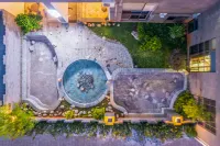 Maitreya Sanlong Hotel (Huquan Hot Spring Ecological Park Honghe Water Town Branch)