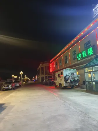 Xingchen Hotel (Coqen) Отели в г. Цоцинь