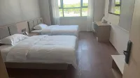 Lvyue Hotel (Yining City Railway Station) Отели в г. Иньинг