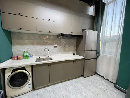 Shili Xijiang Guest House Отели рядом с достопримечательностью «Heilongjiang Institute of Tourism Taiyangdao Campus»