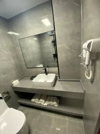 Xiwuqi Jinzun Hotel Отели рядом с достопримечательностью «Baima Cultural Park»