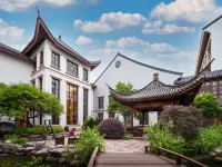 Xinzhi Hotel Hotel berhampiran Jambatan Daqing