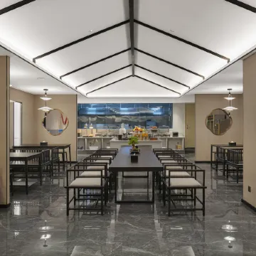 Xunxian Moshang Qingju Hotel