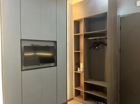 Xinlong Hotel, Dongfang Отели в г. Цидун