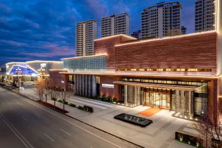 YUANDA YIHAI INTERNATIONAL RESORT Отели рядом с достопримечательностью «Chuxiong Normal University (Yangguang Avenue)»