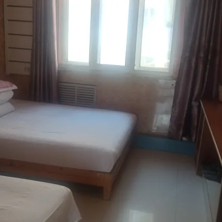 Yingbin Hotel Отели в г. Мулин