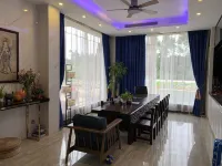 Xingfuli Xilai Holiday Apartment