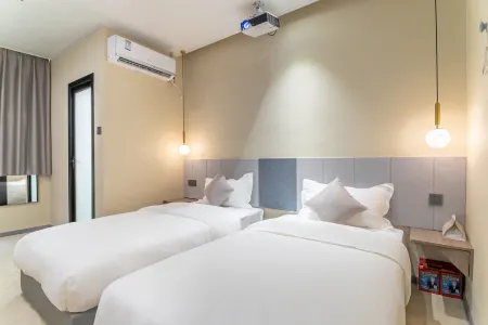 โรงแรมจิ๊กซอว์ (สาขา สถานีรถไฟฟ้าใต้ดินหมู่บ้านใหม่เฟิ่งหวง เจียงหนานตะวันตก)